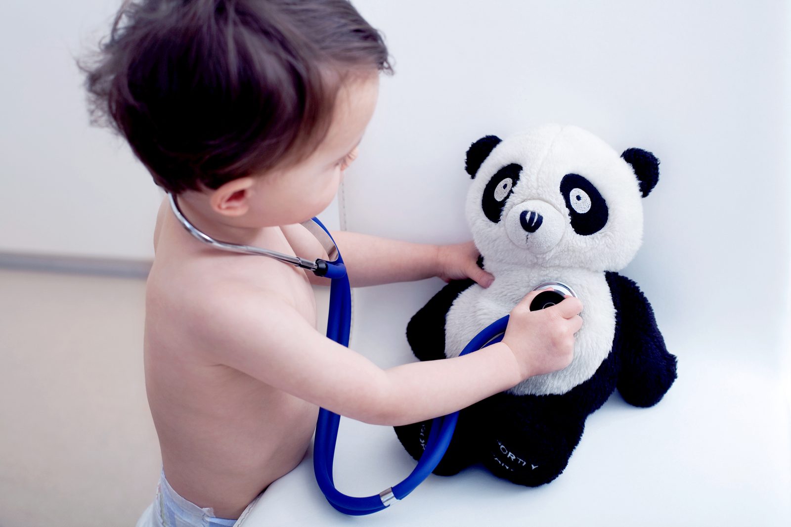 A child playing doctor